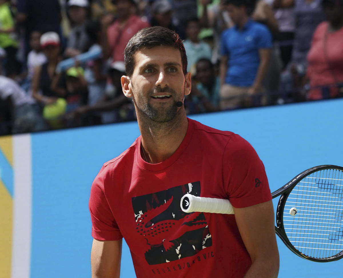 Djokovic with tennis racket