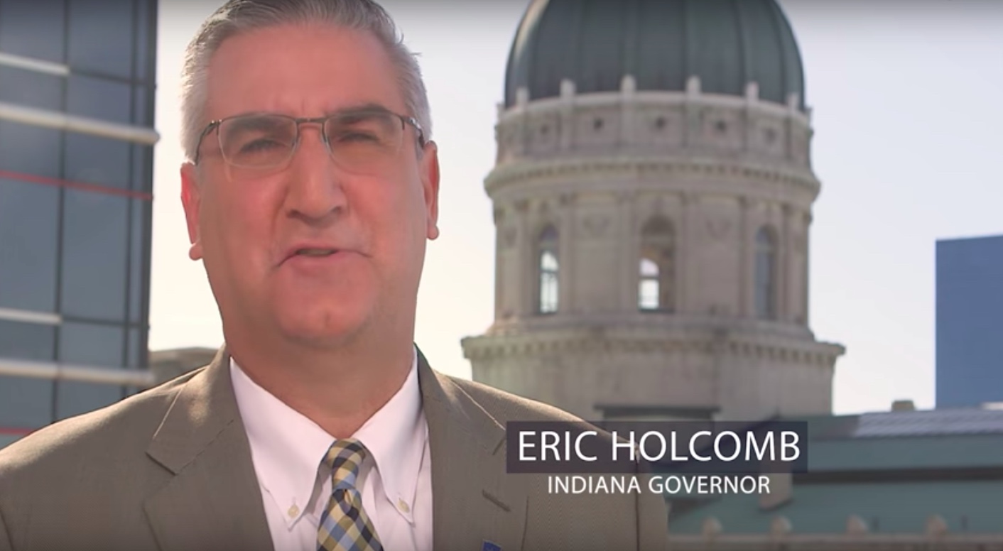 Eric Holcomb in Rauner ad
