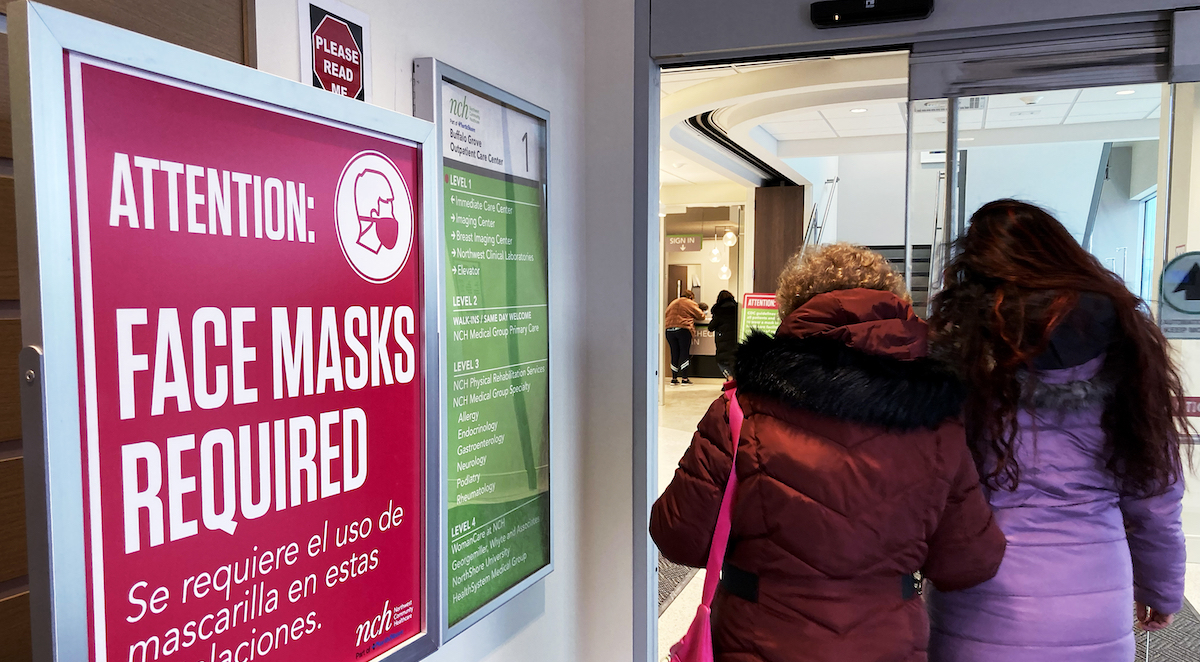 Face masks required sign in Buffalo Grove, Ill., hospital, 1-13-2023