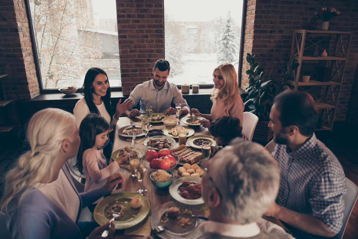 Family at Thanksgiving dinner table