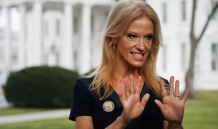 Conway in front of White House photo