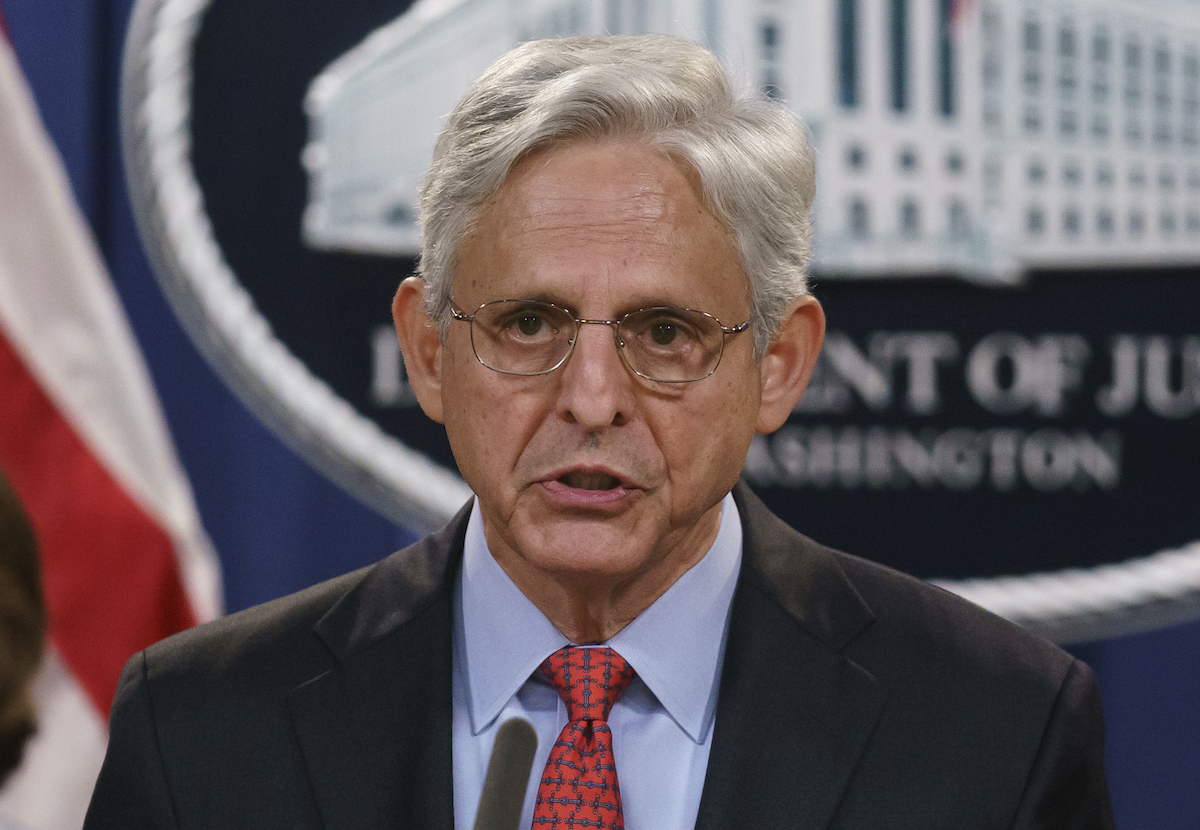 Merrick Garland at DoJ podium