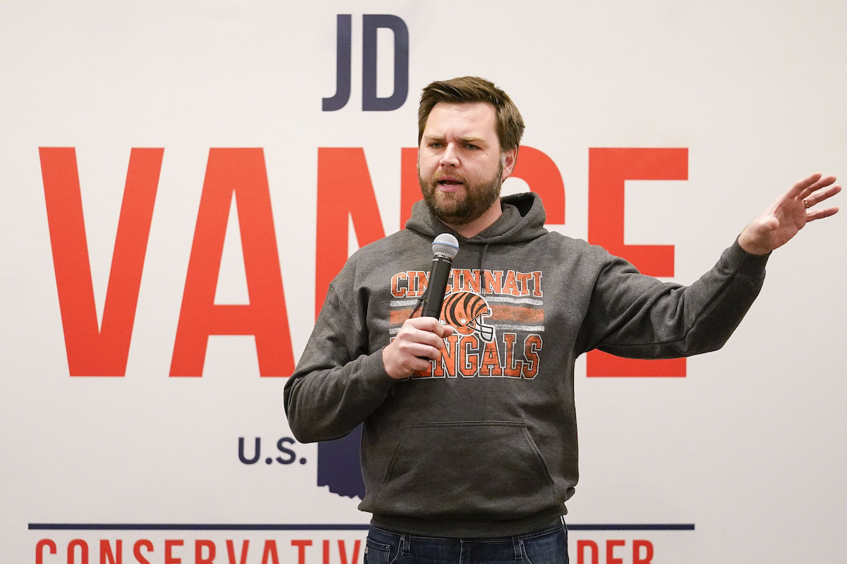 J.D. Vance with Vance sign background