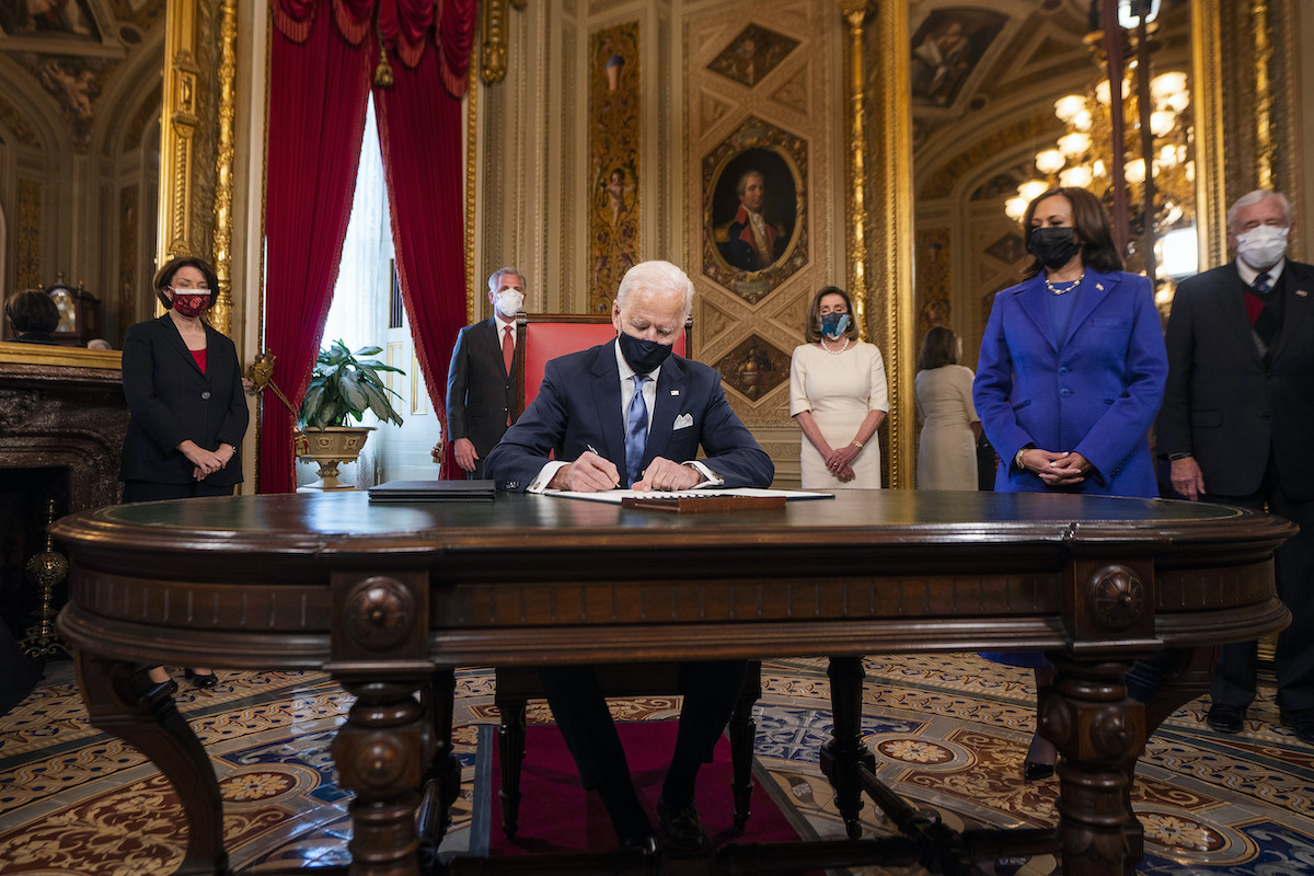 Joe Biden signing documents at Capitol on 012021