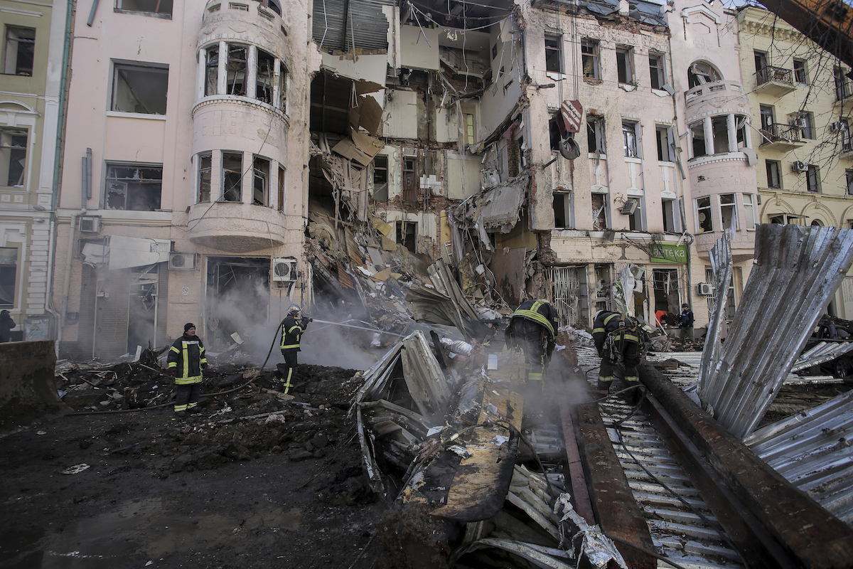 Firefighters battle apartment fire in Kharkiv