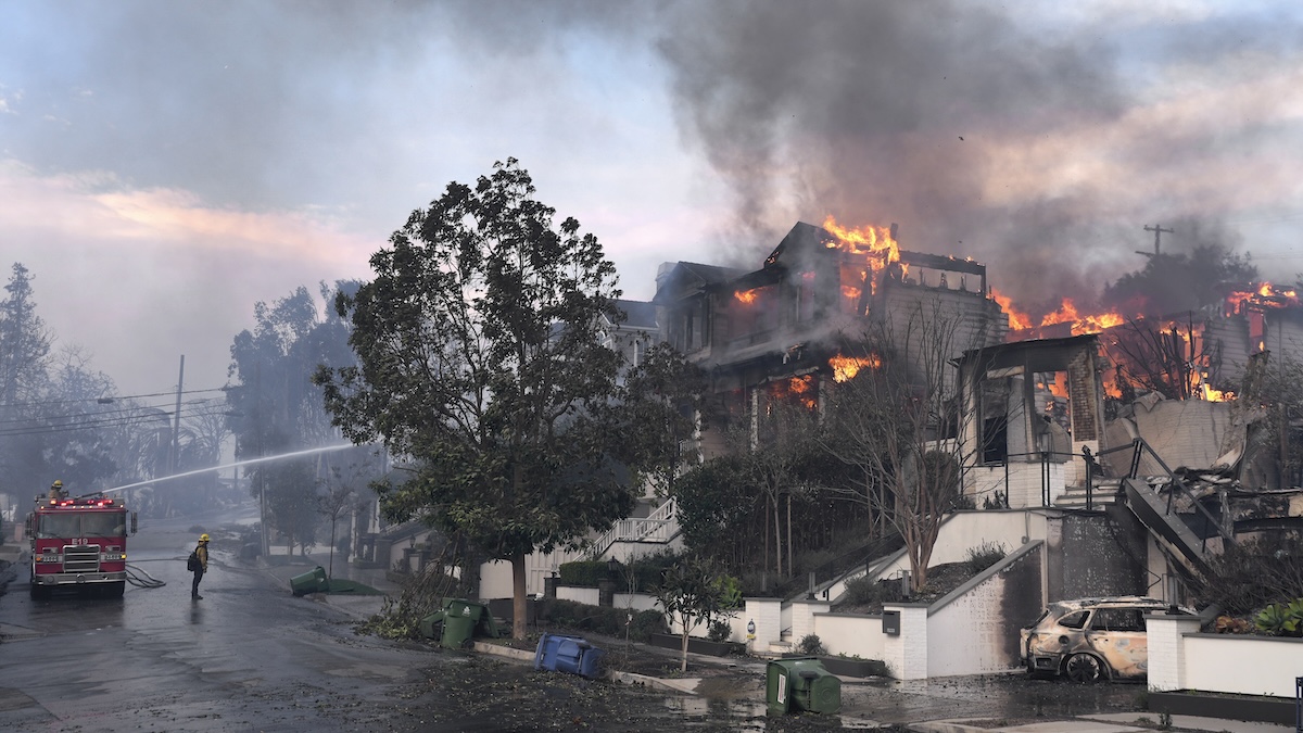 Los Angeles Fire Department firefighters work to extinguish house fire 01-08-2025