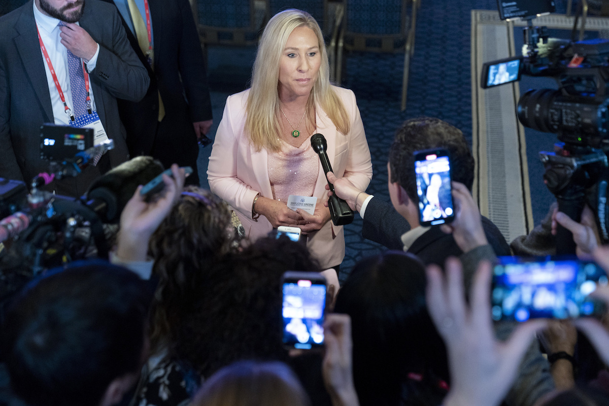 Marjorie Taylor Greene speaks to reporters at CPAC in 2023