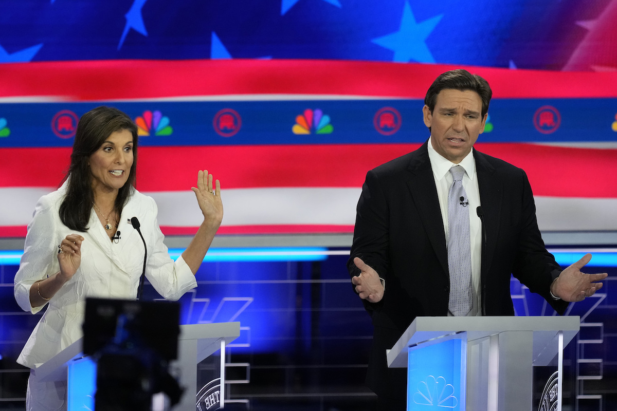 desantis haley on debate stage in miami, 11-8-2023