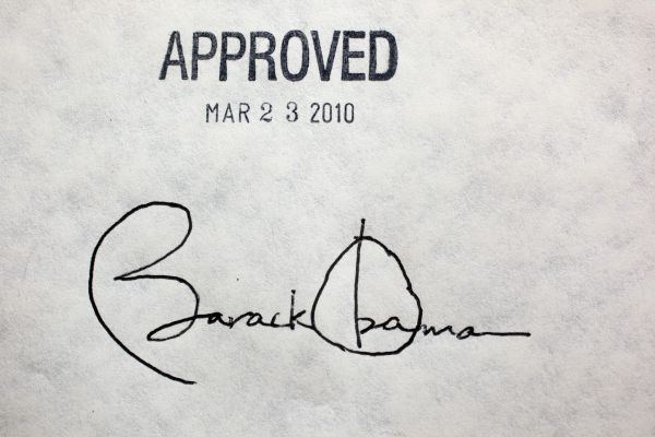Obama's signature on ACA