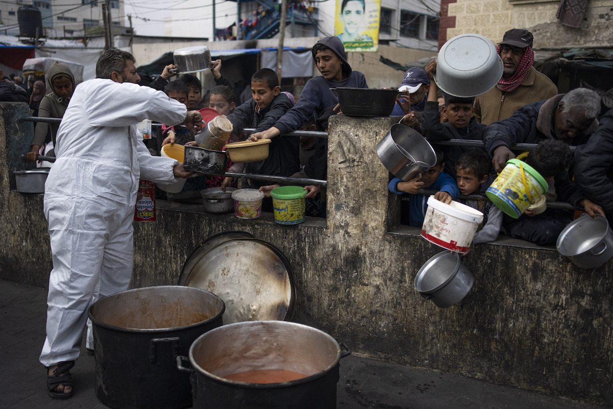 Palestinians line up for free food in Rafah, Gaza Strip 2-23-2024