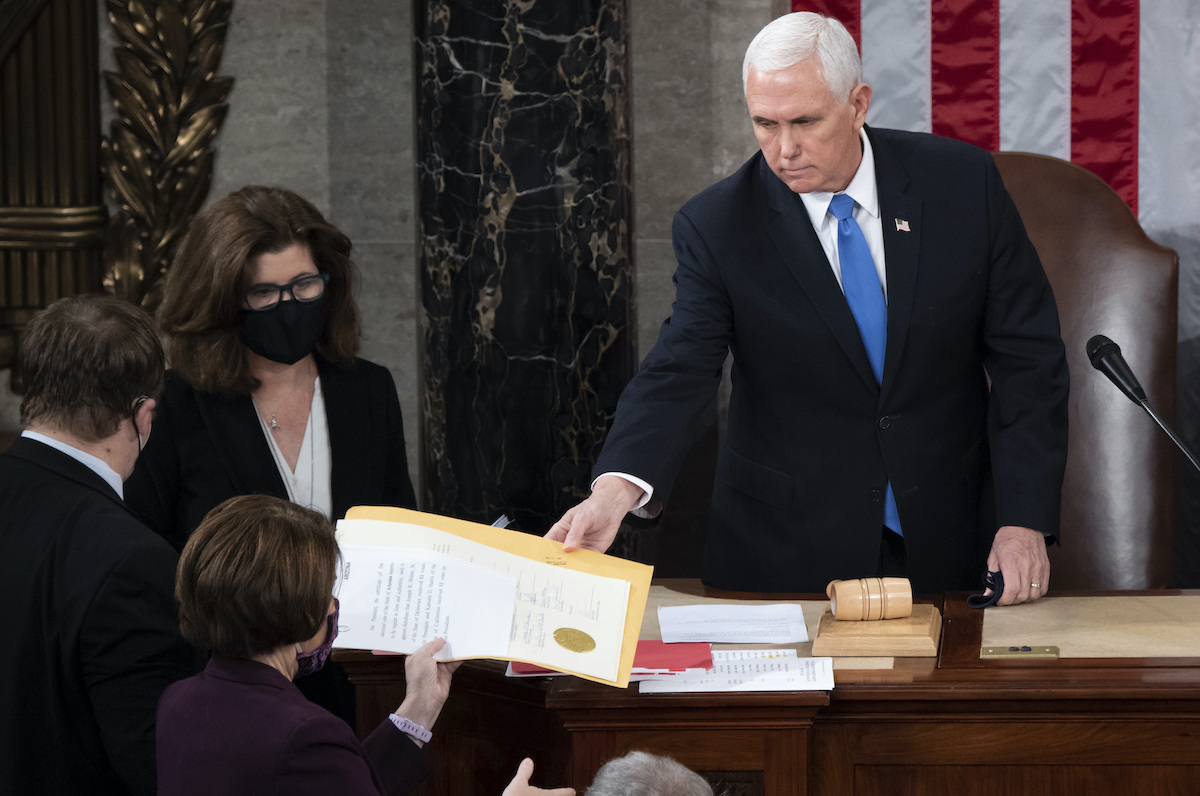 Pence hands electoral certificate 1-6-21