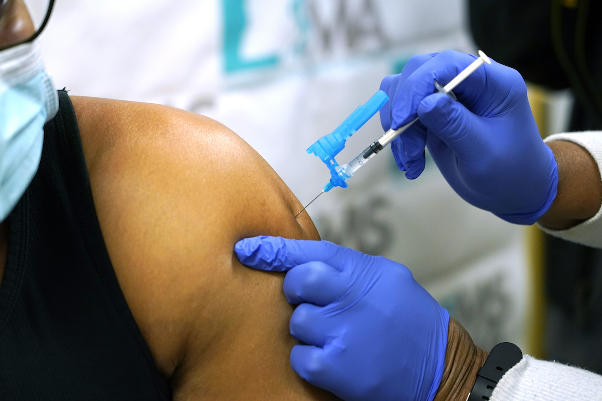 Pfizer vaccination arm shot
