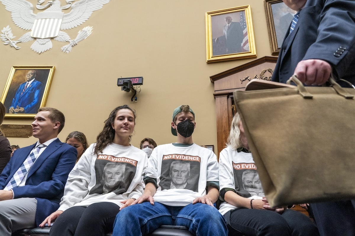Protesters in "no evidence" T-shirts at Biden impeachment hearing, 9-28-2023