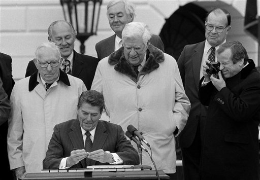 Reagan signs 1983 Social Security legislation