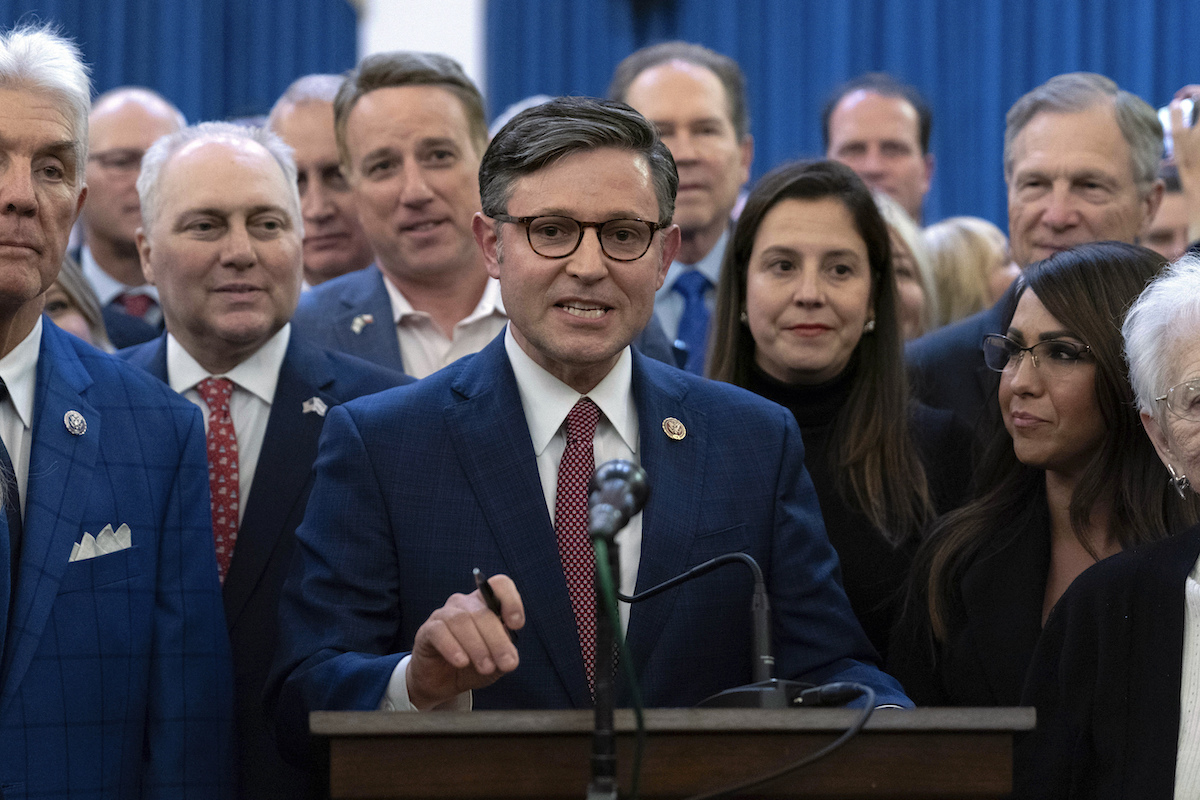 Rep. Mike Johnson surrounded by colleagues 10-25-23