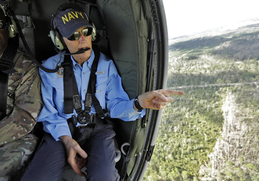 Gov. Rick Scott in a plane after hurricane Oct 2018