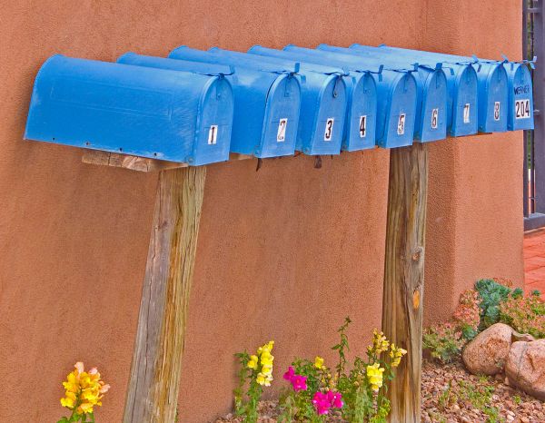 Row of blue mailboxes