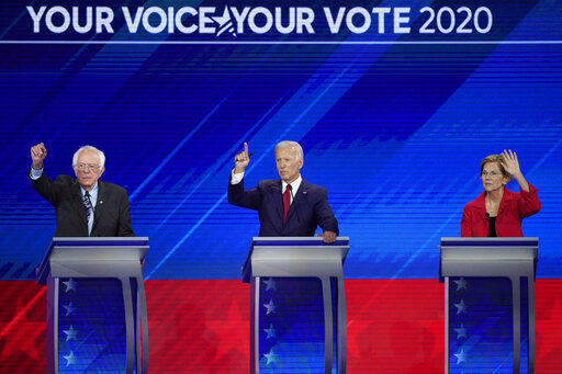 Sanders, Biden, Warren hand raise Houston