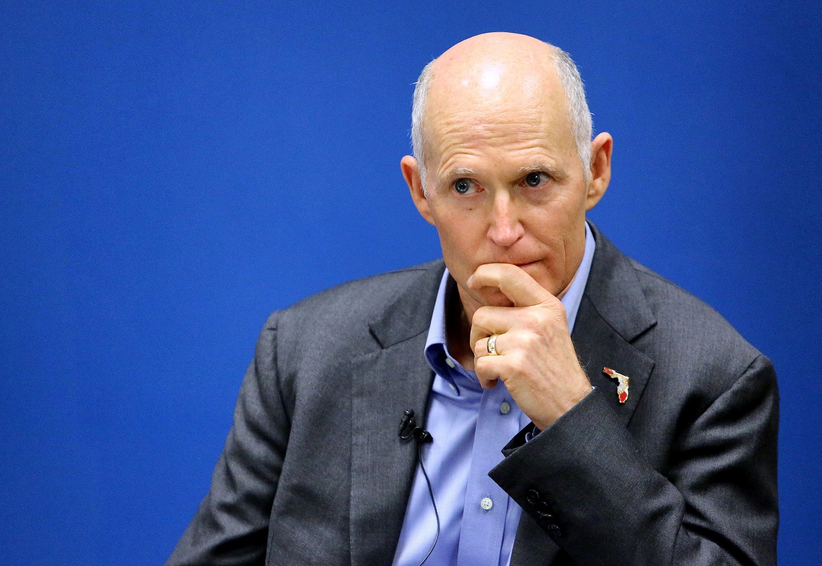 Rick Scott listens to Hurricane Maria updates