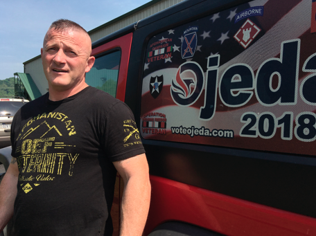 Ojeda outside campaign bus