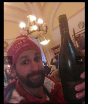 Selfie of Congressional candidate Jason Riddle, holding a bottle of wine he drank while inside the Capitol on Jan. 6