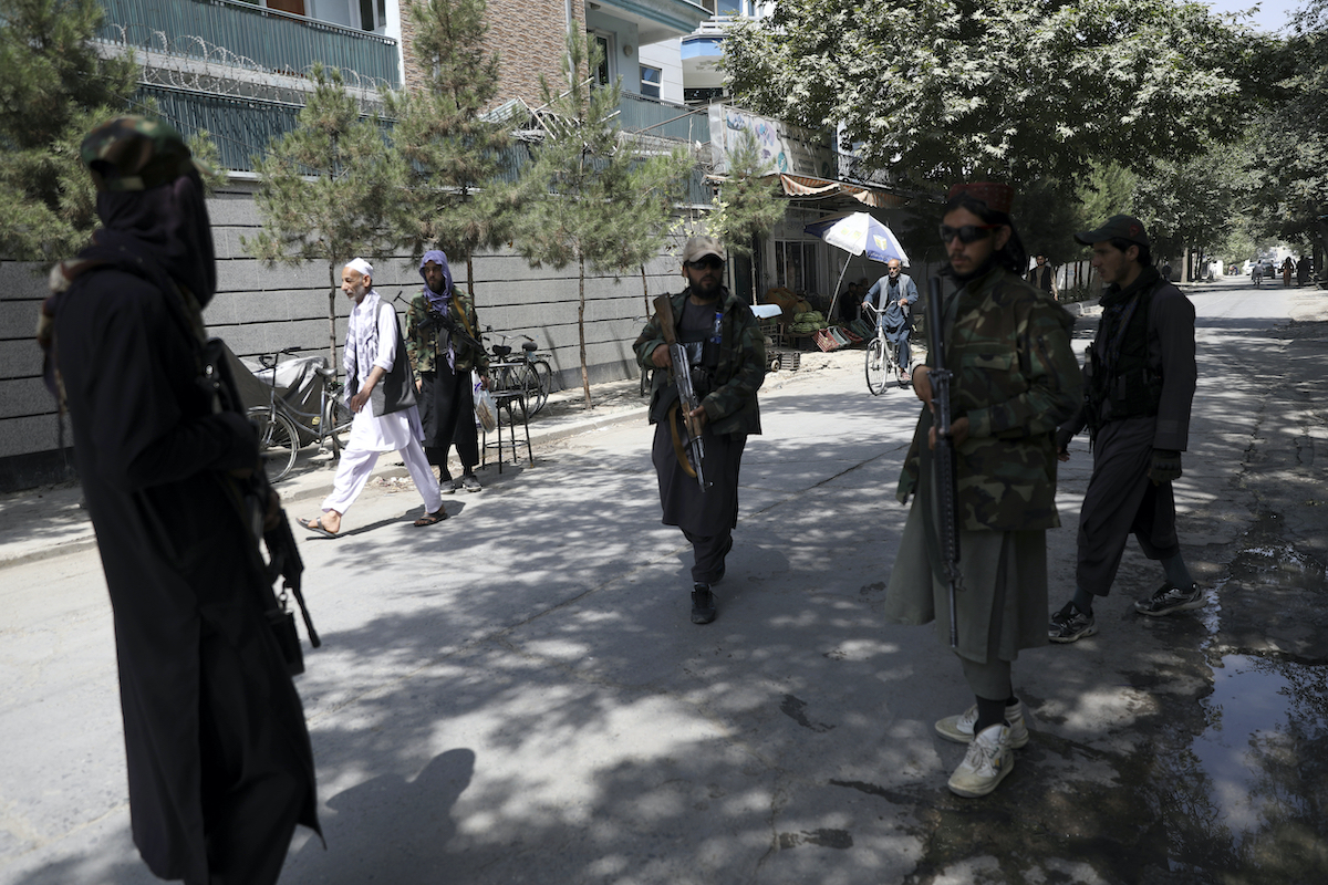 Taliban fighters on a street in Afghanistan 8-22-21