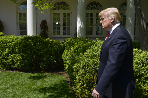 Trump enters Rose Garden