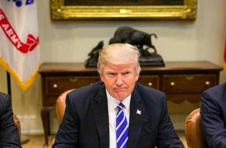 Trump scowls with congressional leaders