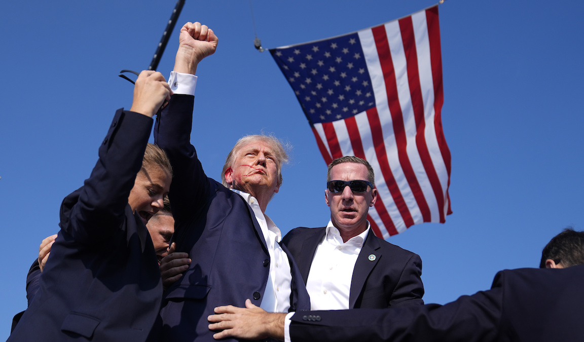 Trump shot in Butler, Pa., fist raised, 7-13-2024
