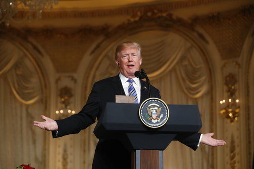 Trump gestures at Mar-A-Lago April 2018