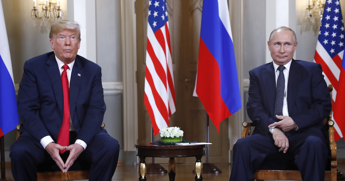 Trump Putin seated in chairs