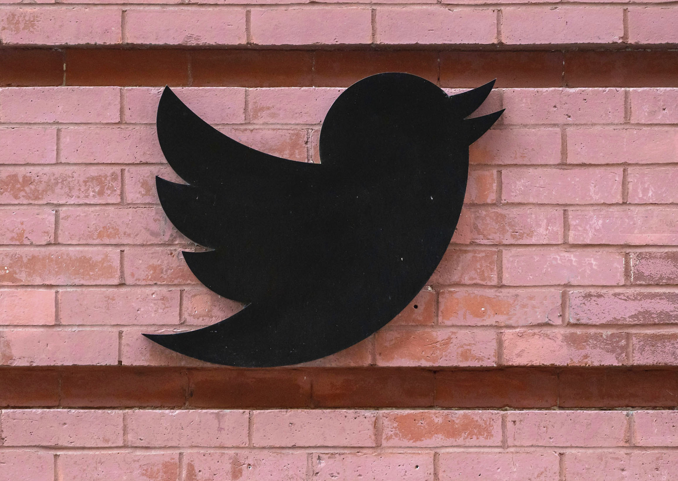 Twitter logo on building from Oct. 2022