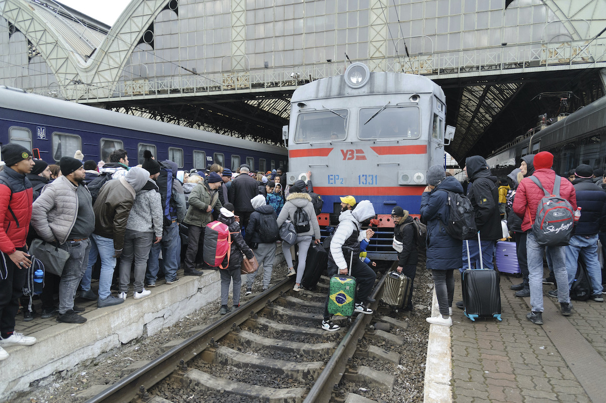 Ukrainians catch train out of Lviv in February 2022