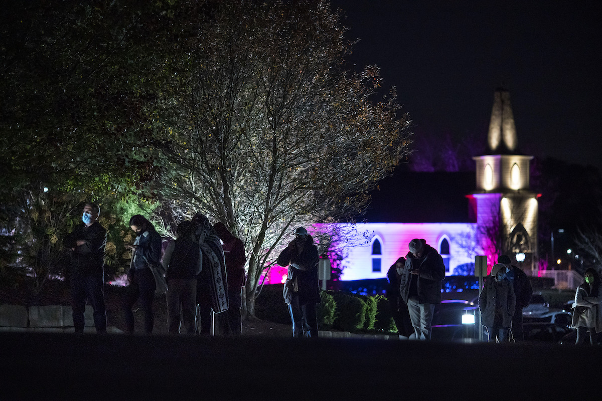 Voters wait in line at Michigan polling place on Election Day Nov. 3, 2020