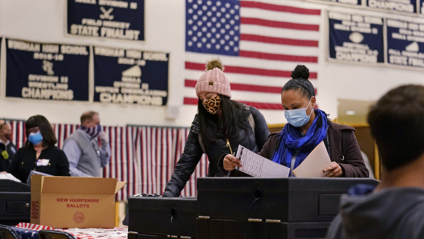 Women voting in masks in Windham, N.H., 11-3-20
