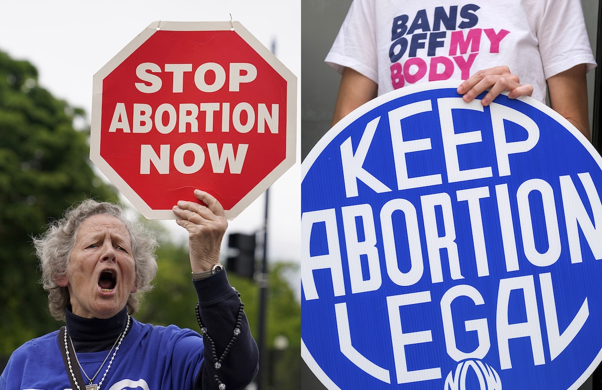 Abortion signs, pro and con, 3-19-2024