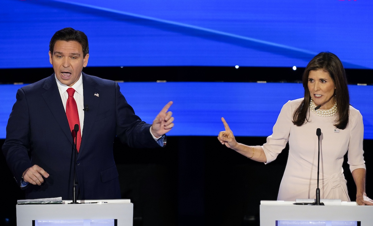 Nikki Haley and Ron DeSantis speak over one another in Des Moines, Iowa, 1-10-2024