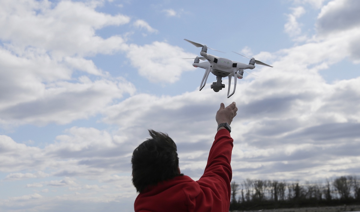 Drone operator at Hart Island, New York, 4-29-2018