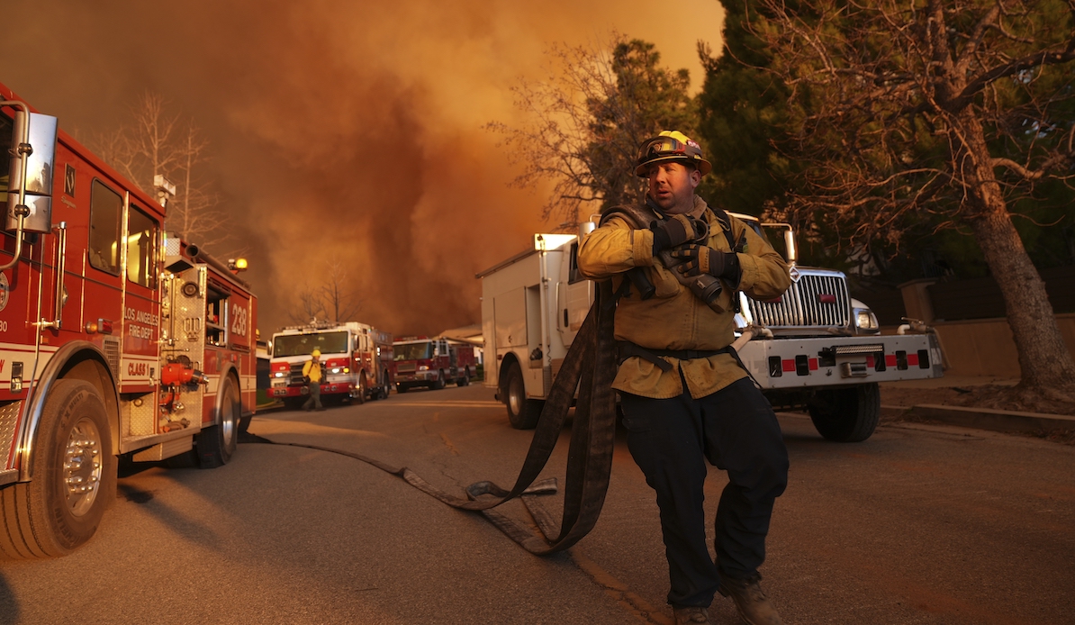 Firefighters in Mandeville Canyon in Los Angeles, 1-11-2025
