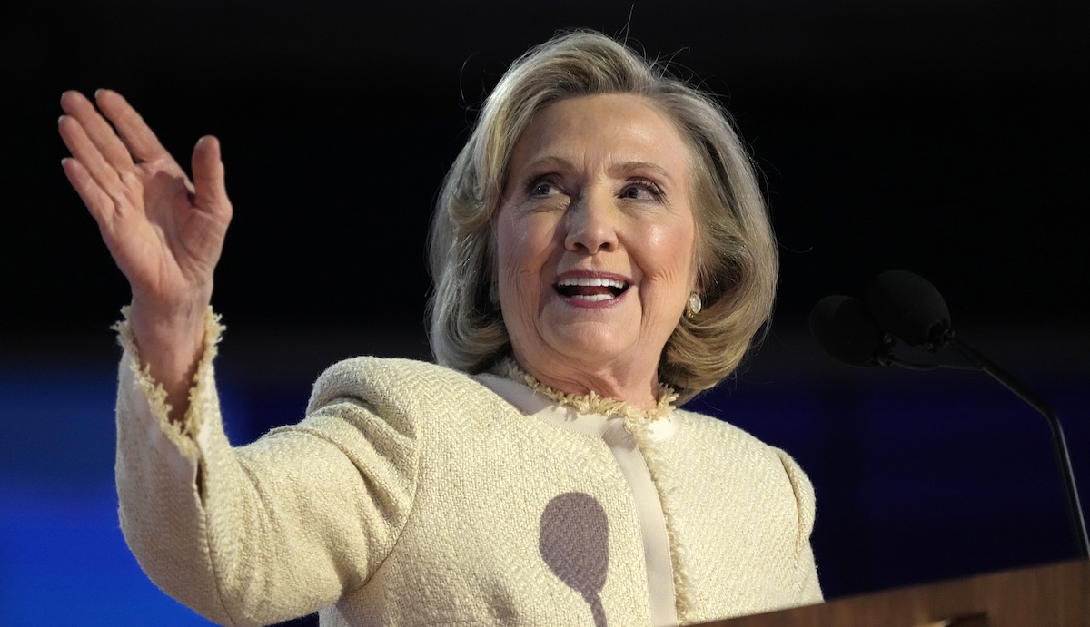 Hullary Clinton at the lectern during the DNC in Chicago, 8-19-2024