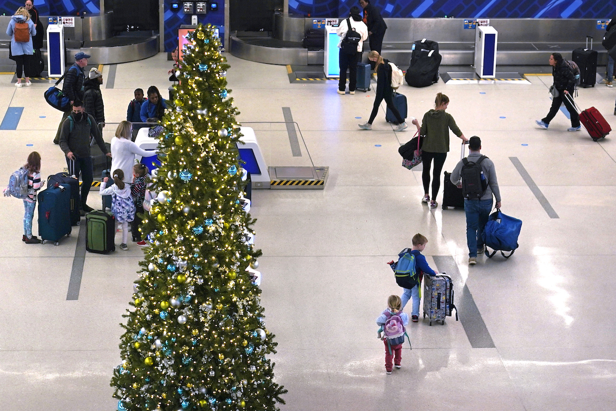 Holiday travelers on Nov. 21, 2022 in Boston