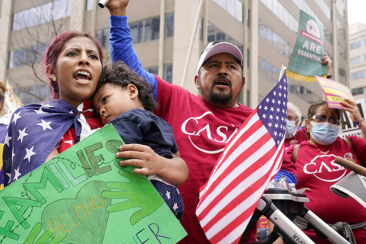 Immigrants marching in washington 9 21 21