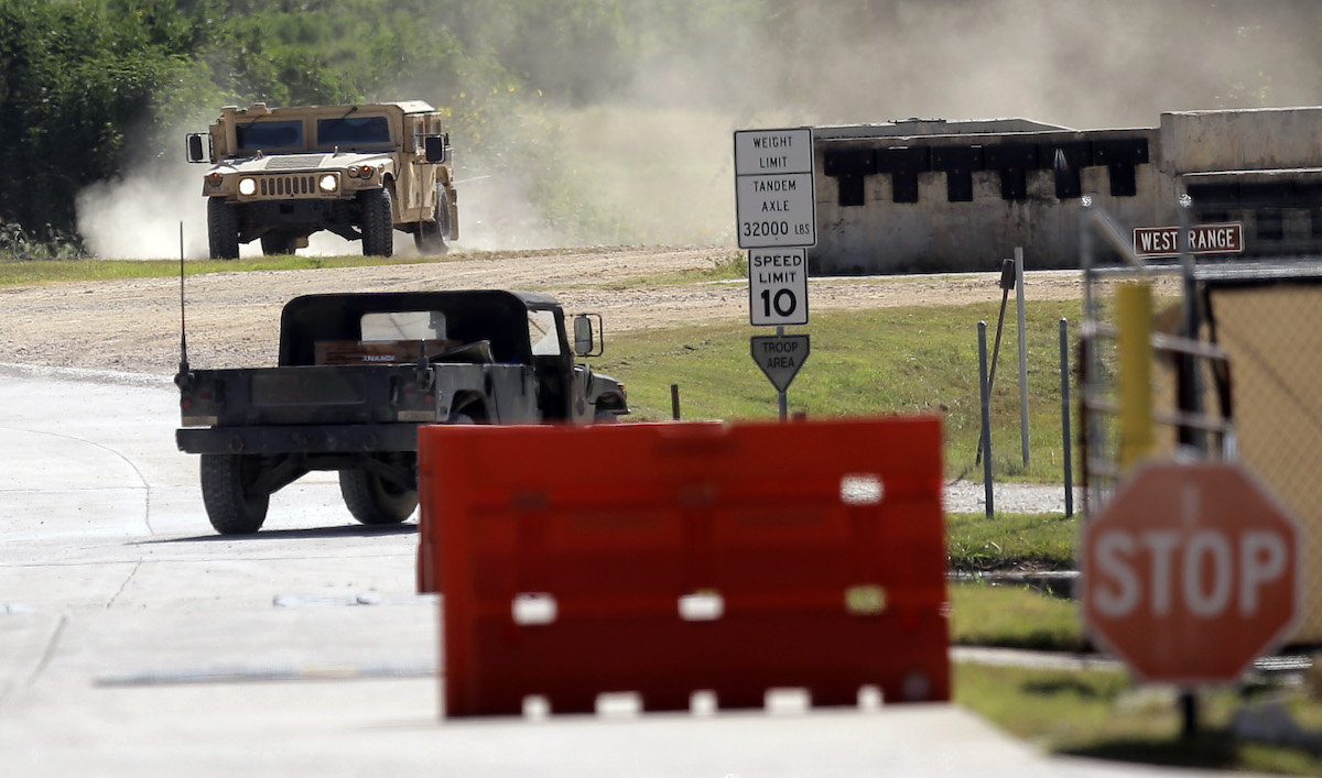 Military vehicles at Texas Army National Guard Camp Swift  in Bastrop, Texas, for Jade Helm military exercise, check, 7-15-2025