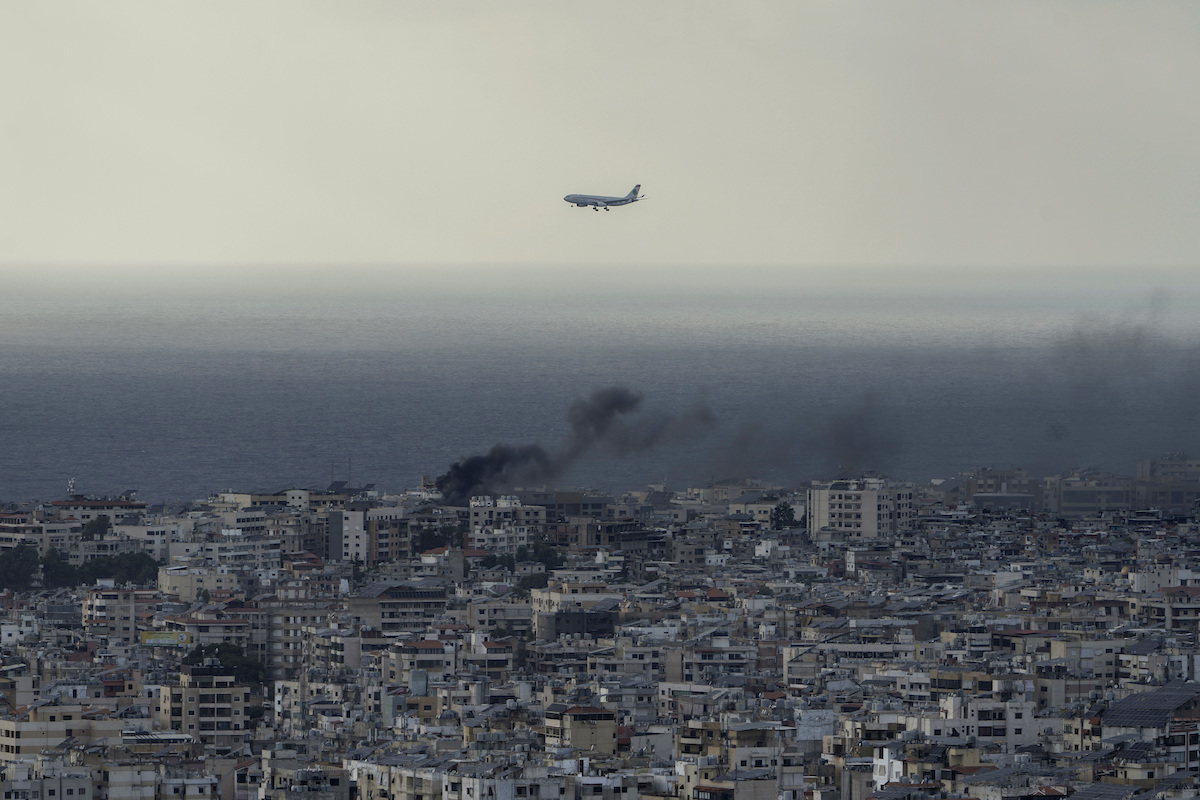 A Middle East Airlines airplane flies over Beirut, Lebanon, 10/01/24