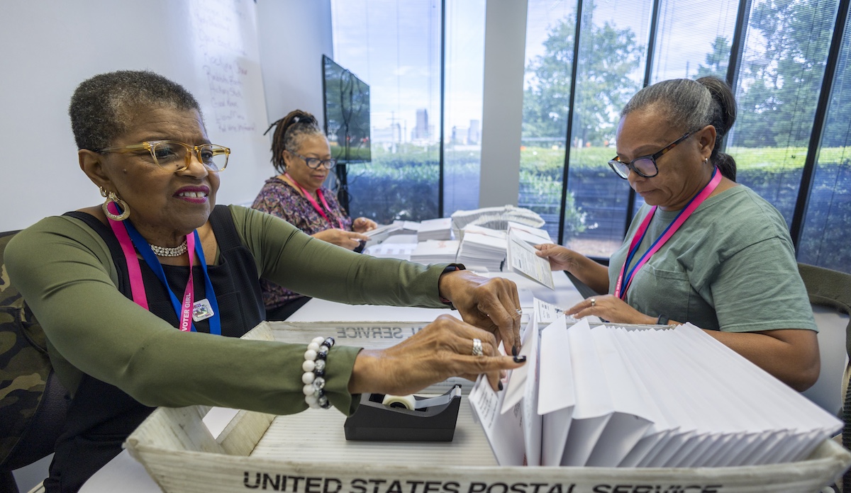 Election workers ready ballots in Charlotte, N.C., 9-5-2024