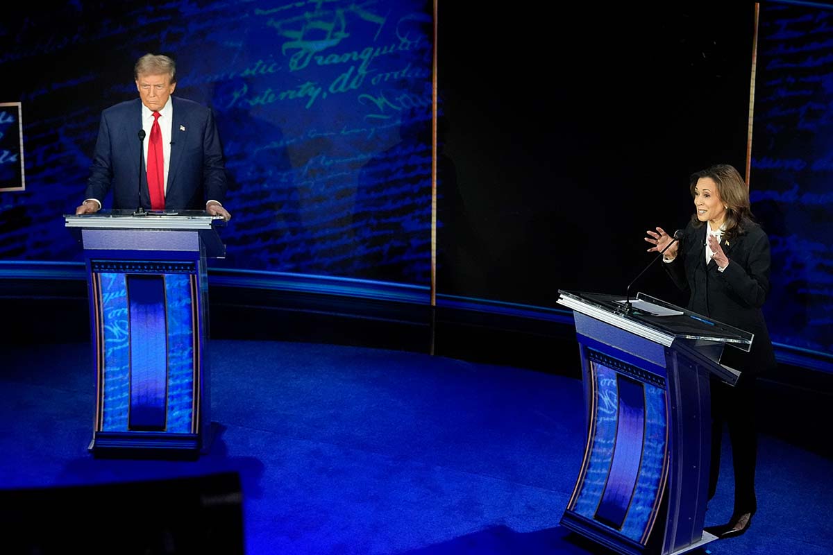 Donald Trump and Kamala Harris debate behind lecterns in Philadelphia 9-10-2024