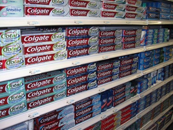 Photo of Colgate toothpaste on shelves
