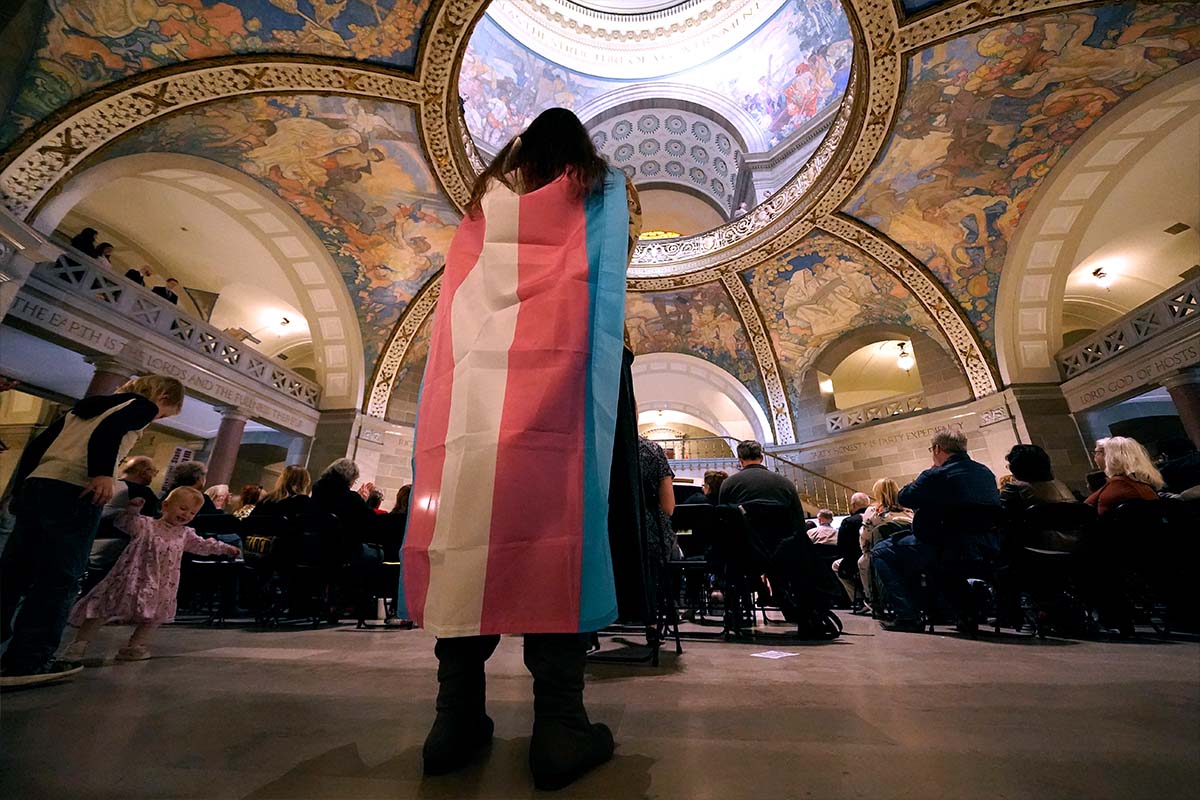 Counterprotester at anti-gender-affirming care rally in Jefferson City, Missouri, 3-20-2023