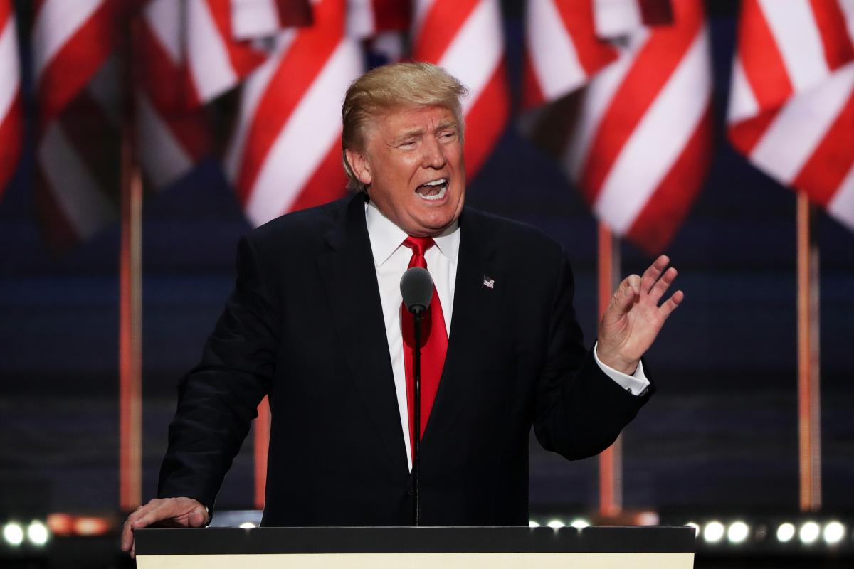 Donald Trump at RNC night 4, one hand up
