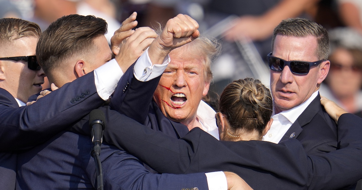Donald Trump raises fist amid Secret Service gaggle in Butler, Pa., 7-13-2024